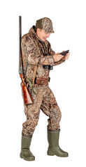 Obraz premium Full length portrait of a male hunter with double barreled shotgun Isolated on white background. hunting and people concept