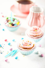 Strawberry cupcakes with color candies