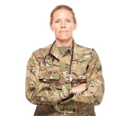 Female Army doctor in uniform looking serious.
