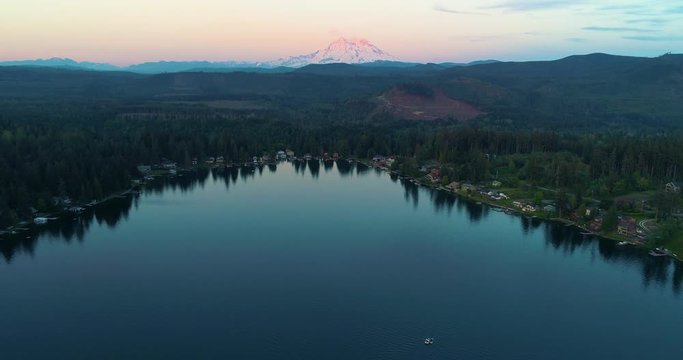 Mount Rainier Vibrant Sunset Boats in Lake Aerial Drone View