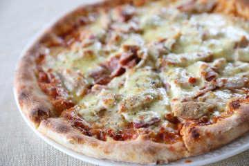 Pizza ham bacon with cheese and tomato sauce