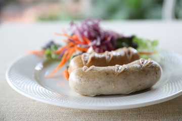 Grilled Pork Sausage on dish in close up