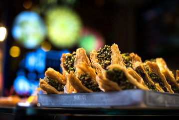 Traditional oriental dessert baklava with pistachios and walnuts