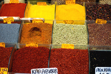 many types of pepper and other spices in containers like vases in Grand Bazaar, Istanbul, Turkey