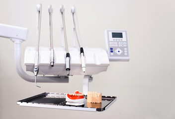 Dental model and dental equipment on white background, concept medical image of dental healtcare,...