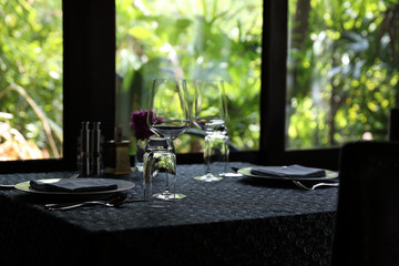 Table set with green nature background