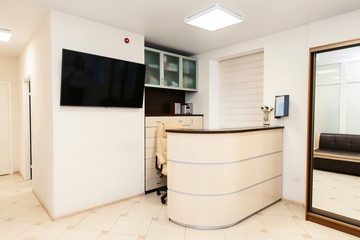 Fototapeta na wymiar Wide shot interior of modern dental clinic with reception desk