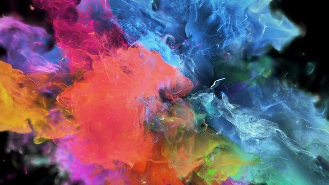 Color Burst - colorful blue pink orange green yellow smoke explosion fluid gas ink particles slow motion alpha matte isolated on black macro close-up
