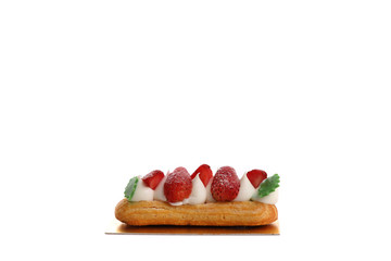 Choux cream with strawberry isolated in white background