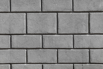 Fototapeta premium the wall and floor which is laid out by a regular concrete square tile with the geometrical drawing. Top view