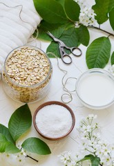 Natural Ingredients for Homemade Oat Body Face Milk Scrub Salt Oil Honey Beauty Concept Organic Eco Healthy Lifestyle Flowers 