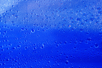 Water drops on a blue background