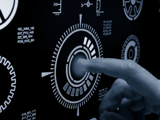 close up of hand pushing botton on futuristic user interface concept. Head up Display(HUD)