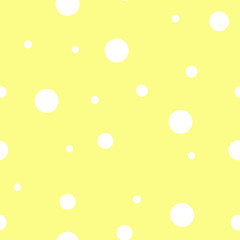 Seamless pattern. White polka dot on the yellow background