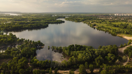 Aerial view of lake in the city. Spring.