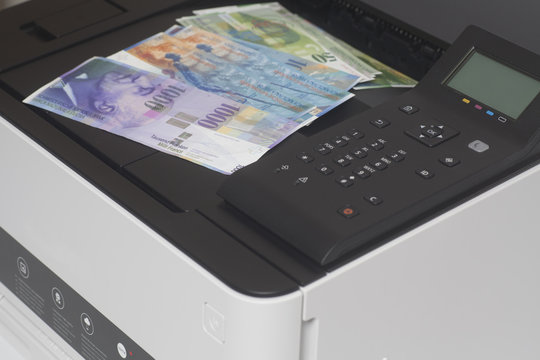 Printer and Swiss francs, currency of switzerland
