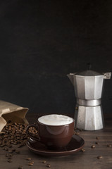 Foam Topped Coffee on a Wooden Table