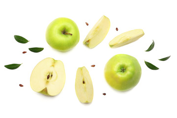 green apples with slices isolated on white background. top view