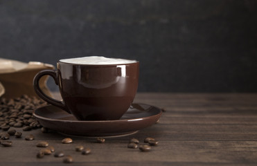 Foam Topped Coffee on a Wooden Table