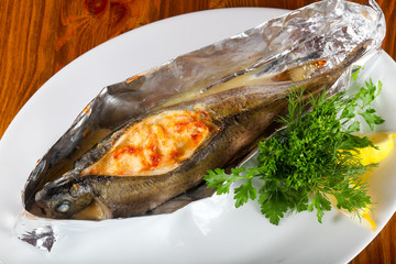 Baked trout with shrimps