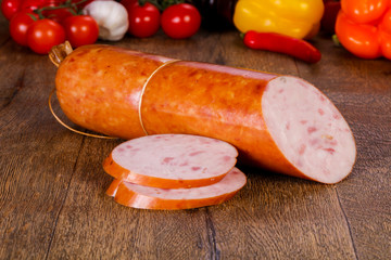 Pork sausages over wooden