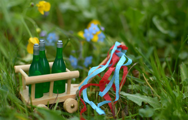 A handcart with three bottles of beer or wine for fathers day