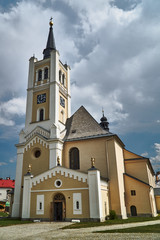 Obraz premium A historic church with a bell tower in the city of Vidnava in the Czech Republic.