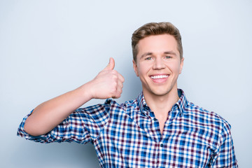 Education study people person assistant trainee agree deal trust concept. Close up portrait of excited handsome confident employee making finger up symbol isolated on gray background casual clothes