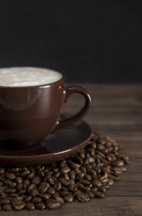 Foam Topped Coffee on a Wooden Table