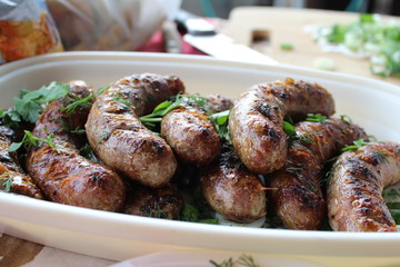 fried sausages from pork on a grill
