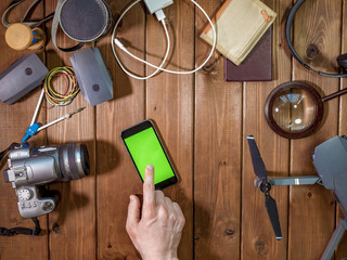 phone chroma key on the table with travel concept