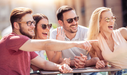 Friends having a great time in cafe
