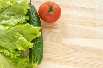 Fresh organic vegetables on wooden table