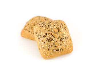 bread with cereals and nuts on white background