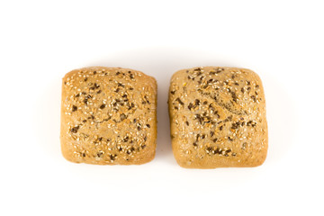 bread with cereals and nuts on white background
