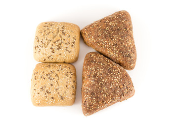bread with cereals and nuts on white background