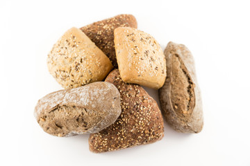 bread with cereals and nuts on white background