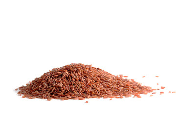 Pile of brown rice on white background.