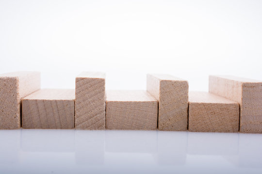 Wooden domino blocks on white background