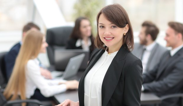confident young business woman with documents