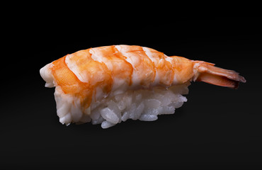 One sushi with shrimp on a black background