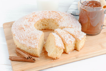 homemade sponge cake on wooden board