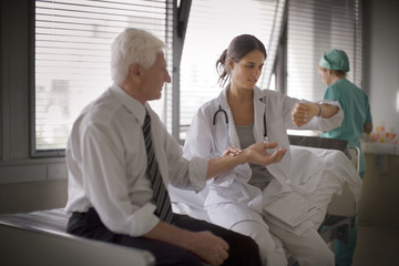 View of a doctor getting himself examined.