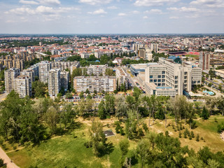 Fototapeta na wymiar Novi Sad, Serbia May 09, 2018: Beautiful drone shot of Liman Park and Novi Sad, Serbia. Panoramic view of the Novi Sad. Novi Sad from the air.