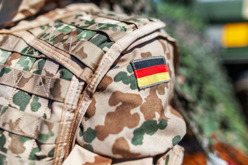 german flag on a german soldier desert uniform
