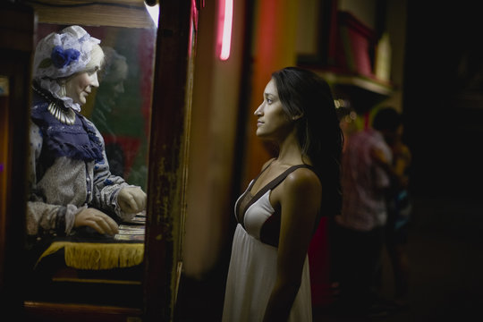 Young adult woman at a carnival