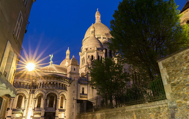 The basilica Sacre Coeur at night , Paris, France.