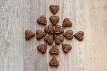 Chocolate Hearts On Wooden Background 
