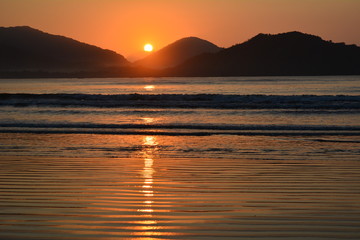 Sunset in Pereque beach, Ubatuba, Brazi
