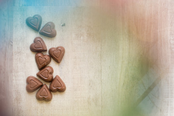 Chocolate Hearts On Wooden Background 